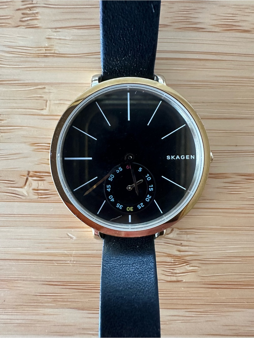 Skagen Women’s Black and Gold Watch - Needs new battery
